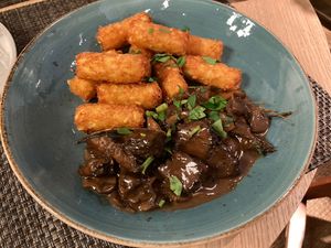 Potato’s with mushrooms and vegan meat  at Enzian Vegan Food in Zurich