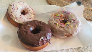Vegan donuts: passionfruit, chocolate, and vanilla w sprinkles at Landlocked Baking Company in Indianapolis