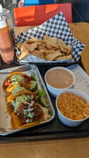 4 tacos, rice, beans, and chips at Tacos Veganos in Phoenix