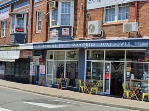 Front and outdoor seating at Swallow Coffee Traders in Rockdale