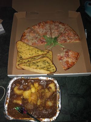 Vegan garlic bread, vegan ‘magi’ pizza and vegan lentil pot pie takeaway all delicious! at Wallace Hotel in Wallace