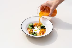 Kimchi soup with chanterelles, confit carrots and wakame seaweed at Anna's Secret Garden in St Petersburg