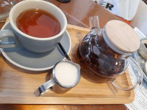 Pot of Ruby Black tea with almond milk at The Little Poet in Hobart