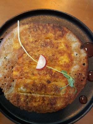 The pan fried dumplings turned out to be a pancake. Giggles. at The Little Poet in Hobart