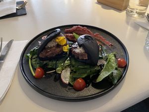 The vegan gua bao buns (without coriander). Filled with an imitation meat and some pickles, the buns tasted a bit like a burger.   at The Little Poet in Hobart