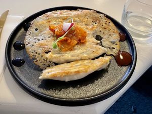 Pan fried dumplings, with the recommended added Kimchi. Dumplings were good. Expected more kimchi for the price    at The Little Poet in Hobart