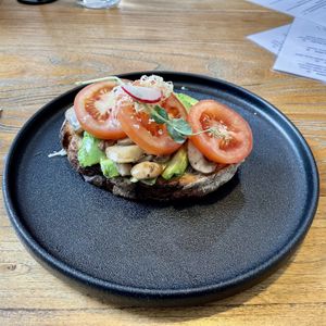 The ‘Avocado on sourdough’, with button mushrooms. Yum but a bit small    at The Little Poet in Hobart