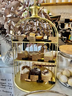 Selection of cakes, top ones are vegan  at The Little Poet in Hobart
