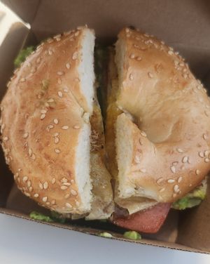 Vegan bacon and vegan egg bagel with avocado at The Little Poet in Hobart