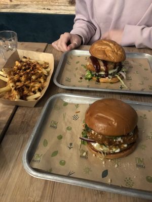 Satay burger, double burger, and bacon fries  at Om Burger in Bristol
