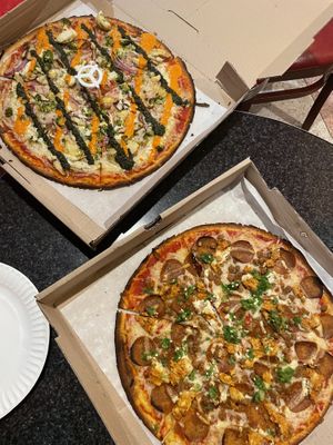 Super Vegan (GF) (left) and ‘Meat’ the Mets Vegan (GF) (right).  at Two Boots - East Village in New York City