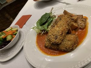 Escalopes with sautéed potatoes and seasonal vegetables (vg) at Casa Ciro in Worthing