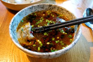 shitake & yellowbean dumplings. kelp broth at alter in East London