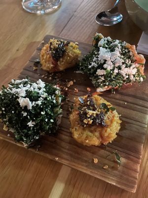 Fermented sticky rice bites and crackers were insanely delicious   at alter in East London