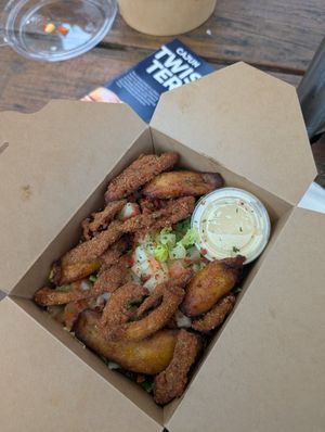 loaded fries with vegan chick'n (oyster mushrooms) at Eleven Oh 7 in Saint Michael