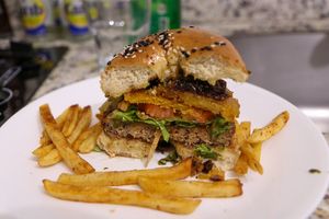 burger with fries at Eleven Oh 7 in Saint Michael