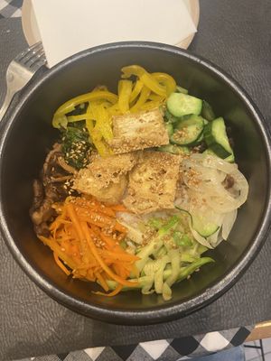 Vegan Bibim Bap, served with tofu instead of egg and meat. With a chilli sauce.   at bibim in Amman