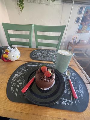 Chocolate cake with caramel Cappuccino   at Cafetería 1987 in San Luis Potosi
