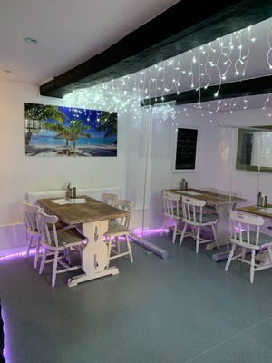 We have COVID screens and spaced out tables  at Green Island Bistro in Rhuddlan