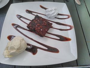 Warm chocolate fudge brownie, with ice-cream at Green Island Bistro in Rhuddlan