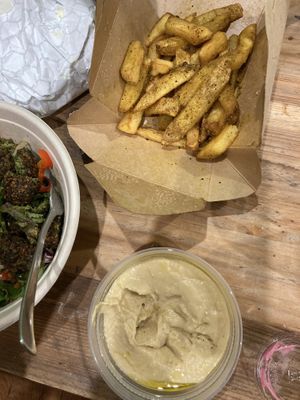 Curry fries and hummus  at Forever Coffee NYC in New York City