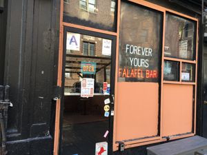 Front of falafel bar. at Forever Coffee NYC in New York City