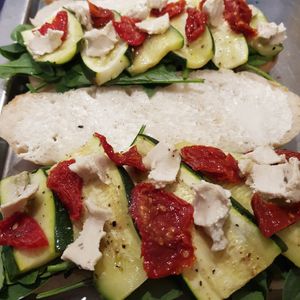 Roast zucchini turkish bread with spinach, house made pesto, sun dried tomatoes, mayo & feta from tlThe Vegan Dairy at A Good Little Thing in Tootgarook