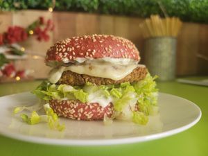 Fishless Filet Sandwish with a beet-root bun. at Lolly's Pantry in North Palm Beach