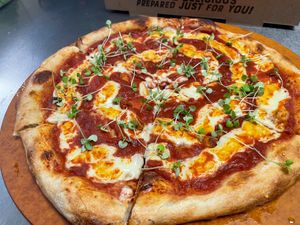 Sprouty Pie.....cashew cheese, tomato sauce with your choice of sourdough, gluten-free or spelt crust. at Lolly's Pantry in North Palm Beach