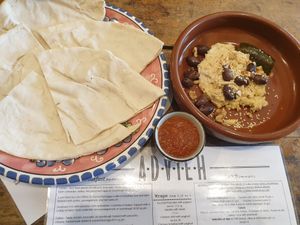 Hummous w/flat bread, olives, dolmade, harissa sauce at Advieh in Seddon