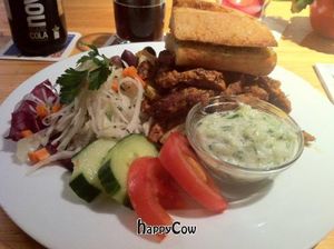 Gyros Plate with soy-gyros, pita bread with herb-butter, coleslaw, tzatziki, hummus and olives. at Viasko - Bar und Restaurant in Berlin