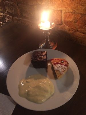 Lovely candle lit booth and some of the sweet options from the brunch buffet  at Viasko - Bar und Restaurant in Berlin