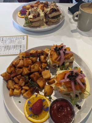 Lox eggs Benedict in front, jackfruit eggs Benedict in back at Astoria Bistro Botanique in Gatineau