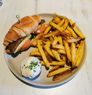 Croissant breakfast sandwich at Astoria Bistro Botanique in Gatineau