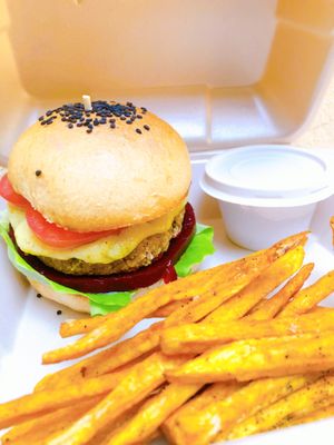 Vegan Burger served with sweet potato fries and pink hummus at Chillicon Valley in Puerto Escondido