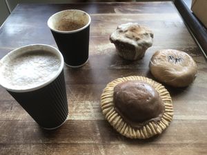 Triple chocolate cheesecake cookie pie, monkey bread, breakfast taco holache, Sinfull hot chocolate and cappuccino    at Sinfull Bakery in Houston