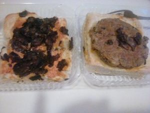 Ultimate vegan burger kolache. Tomato cream cheese kolache with sauteed mushrooms, tops Housemade 3 bean smoked veggie patty with pickles, caramelized onions.  at Sinfull Bakery in Houston