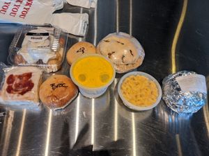 My buys; cinnamon roll, kolaches - strawberry, broccoli & cheese, & potato, Broccoli & cheese soup, pot pie, mac & cheese, savory bean burger at Sinfull Bakery in Houston