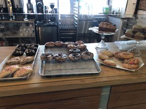 Doughnuts, sliced loafs, muffins and more pastries. Still no labels   at Le Petit Monstre in Brooklyn