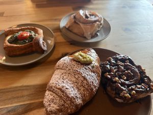Pistachio croissant, pecan roll, cinnamon roll, and spinach danish   at Le Petit Monstre in Brooklyn
