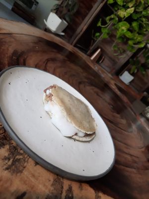 Gordita de frijol con queso derretido artesanal sin gluten, soya, papa ni harinas  at Tapatia Vegan Tacos in Tulum