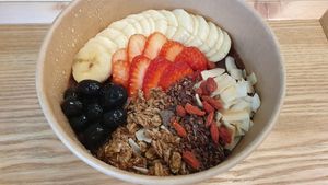 Acai Beauty Bowl. It looks half empty, but it was a tall bowl! at THE_B in Tokyo