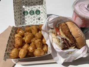 Tater Tots (make it cheesy) & Strawberry milkshake 💓 at Neat - Soho in London