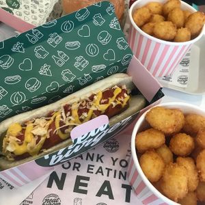 Hotdog and potato tots at Neat - Soho in London