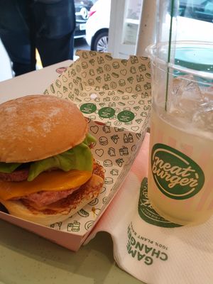 Their signature burger and cocktail. at Neat - Soho in London