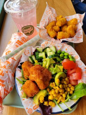 Salad option with cauliflower wings, tater tots, a mushroom meat wrap (great) and pink lemonade (too sweet) at Neat - Soho in London