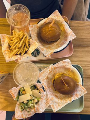 Double cheese burger, Caesar salad and lemonade (bottom tray)   at Neat - Soho in London