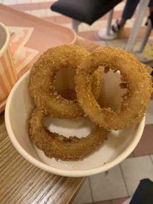 A full portion of onion rings   at Neat - Soho in London