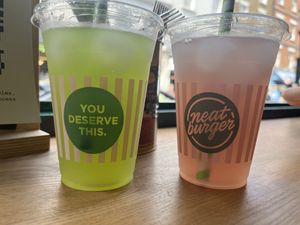 Two lemonades. The matcha one and the bramble one  at Neat - Soho in London