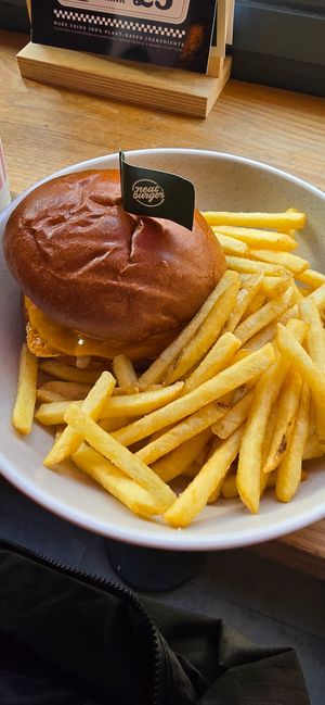 Smash burger and fries at Neat - Soho in London